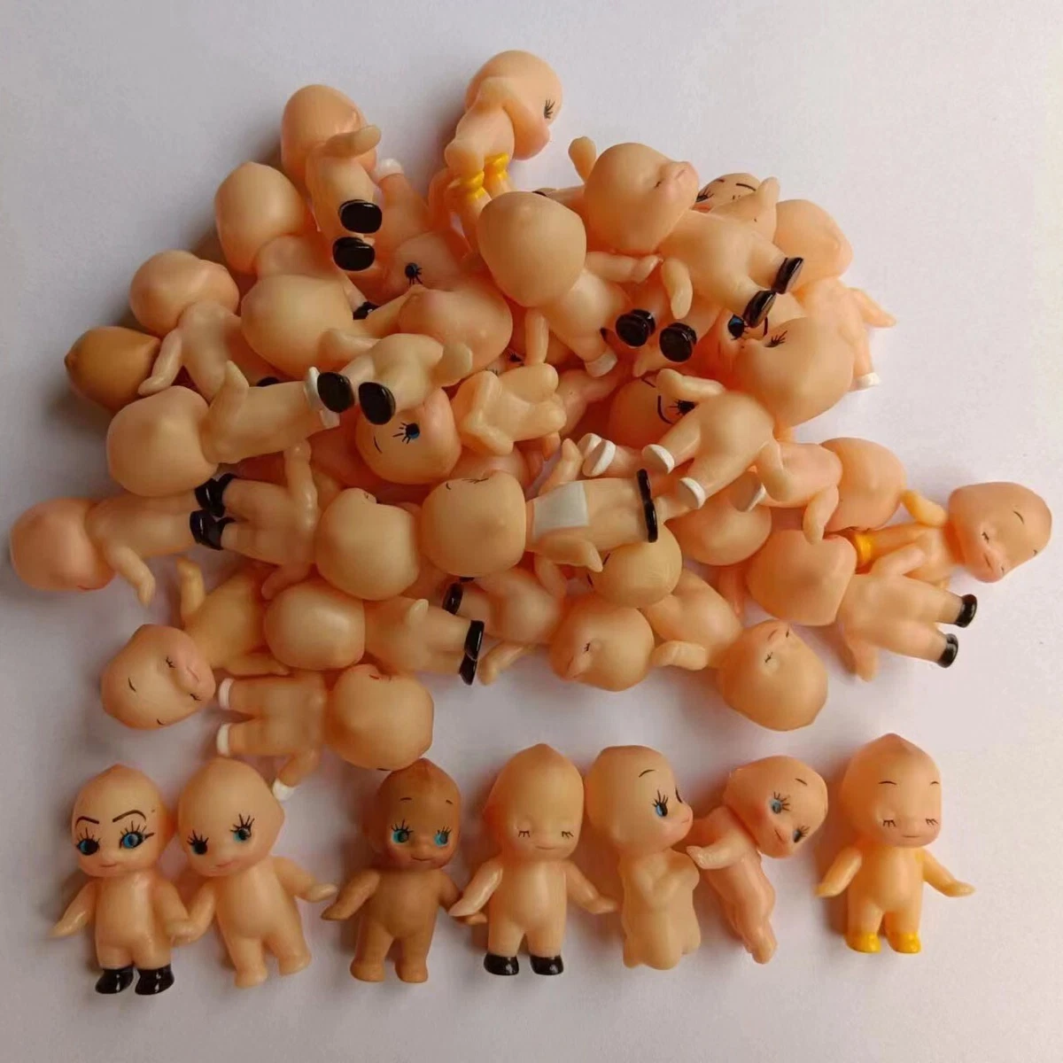 lot of 20 by random Soft Plastic Kewpie Baby Doll mini Figure