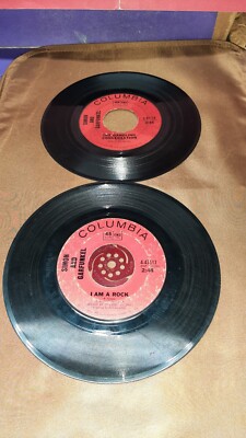 (BR1) ---Two 45 RPM Simon & Garfunkel 7'' Records Tested & Play Well 
