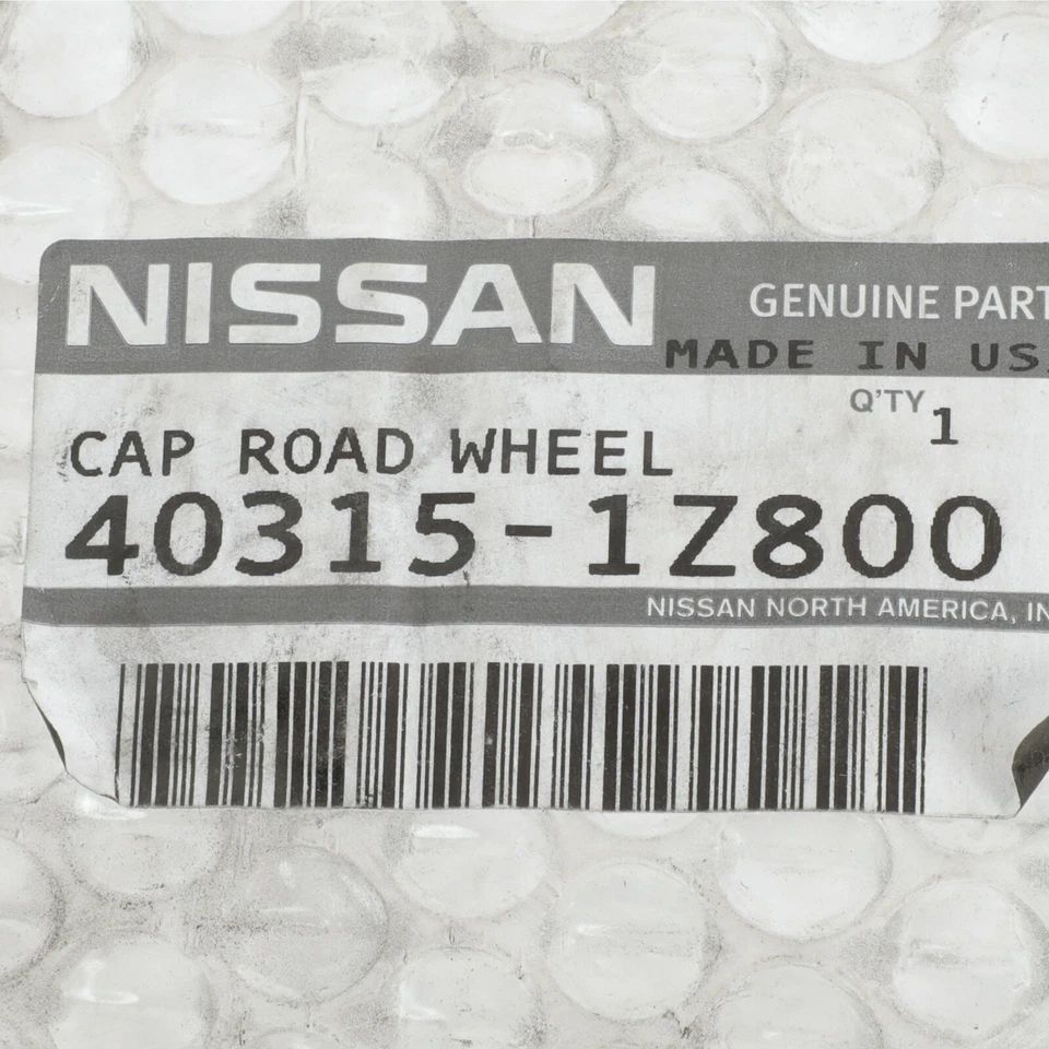 2003-2004 Nissan Xterra tampa de cubo central de roda prata com emblema cromado fabricante de equipamento original novo - Imagem 3 de 3