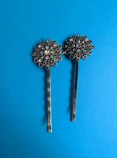 vintage silver filigree hair bobby pins feature floral designs
