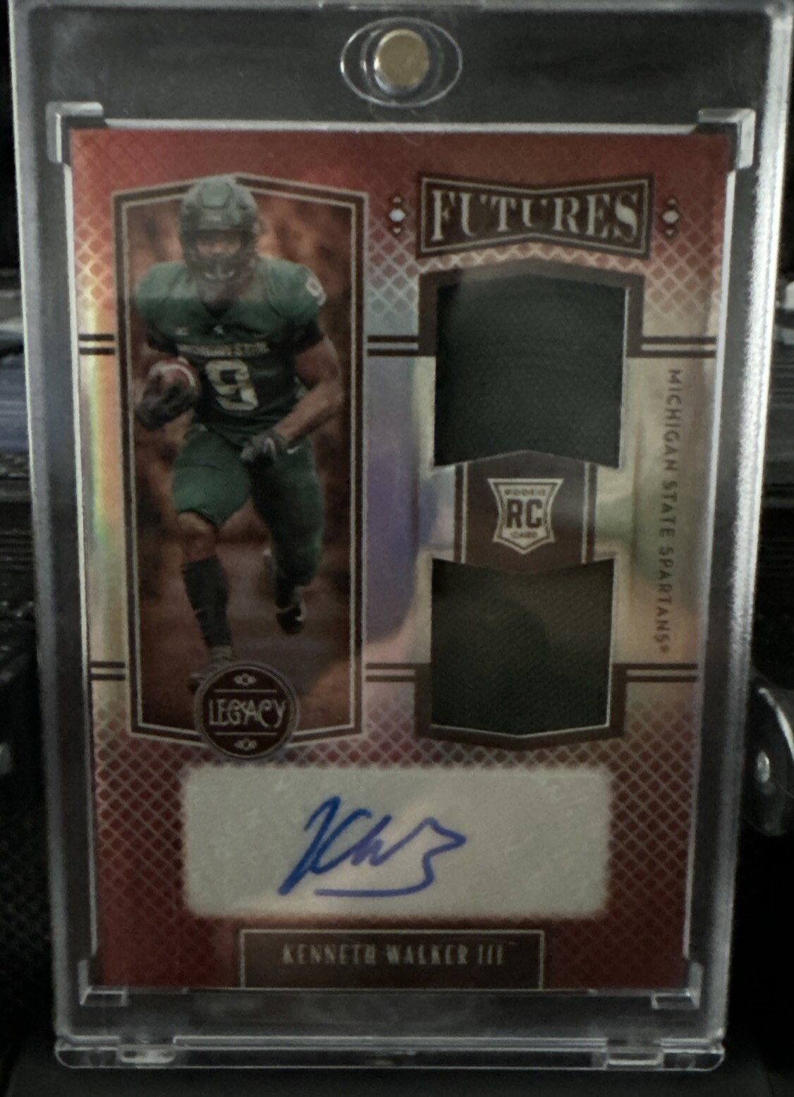 Kenneth Walker III Panini Legacy Futures Dual Patch Autograph #FDKW Ruby