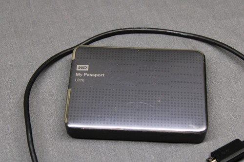 WD My Passport Ultra 2TB External Portable Hard Drive WDBMWV0020BTT-05 USB (H4) - Photo 2/7