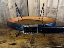 Men’s black leather belt with a "BRILAN MILAN ITALY" belt buckle. Size 38