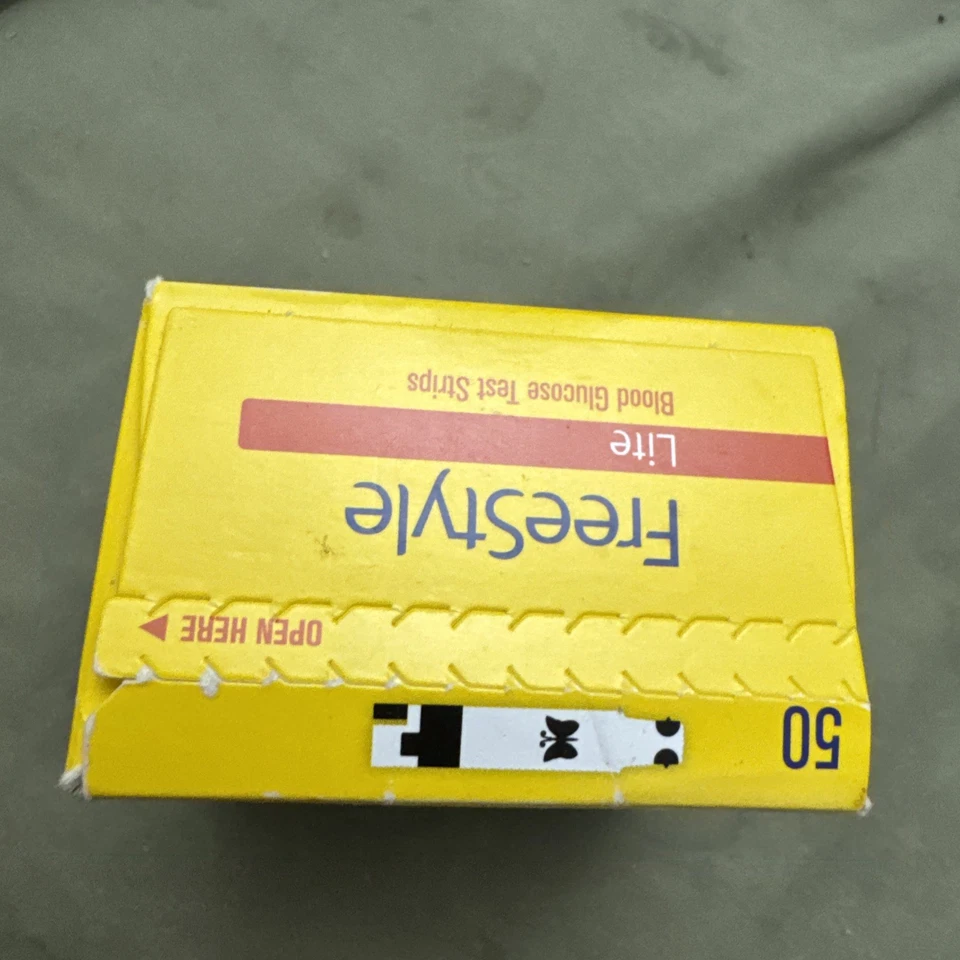 Tiras reactivas de glucosa en sangre Freestyle Lite - 50 unidades abolladas 4/27 Foto 4 de 4