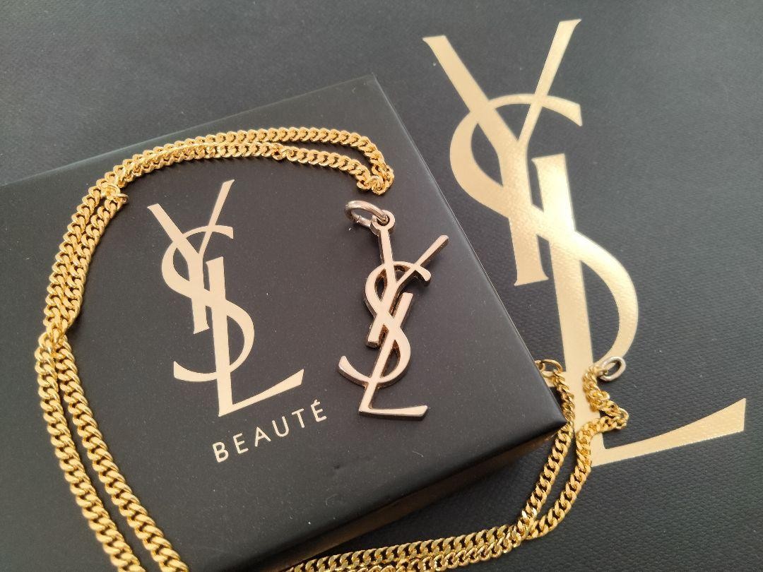 Collana YVES SAINT LAURENT con ciondolo logo oro