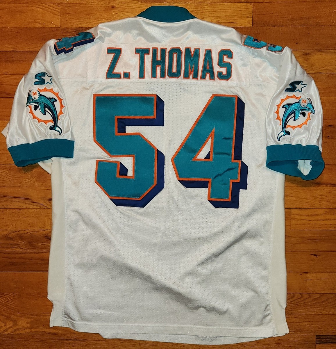 AUTHENTIC * STARTER Miami DOLPHINS THOMAS Jersey Men 54