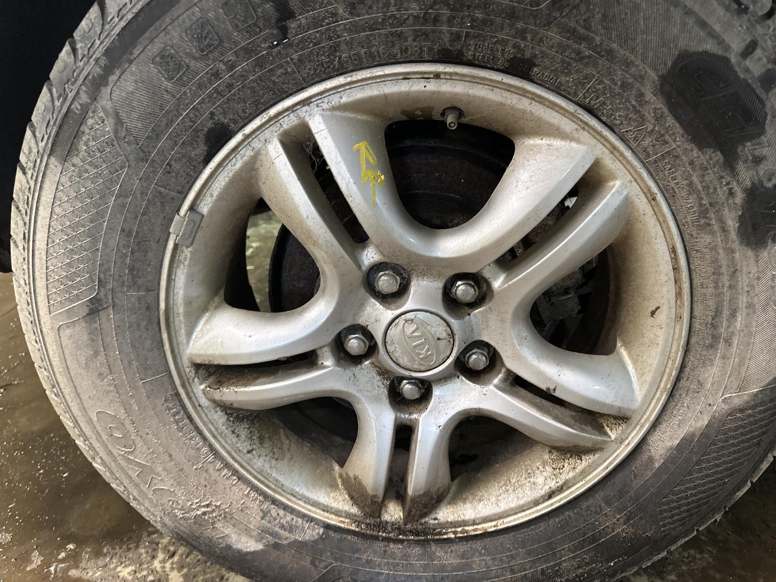 Used Wheel fits: 2005 Kia Sportage 16x6-1/2 alloy 10 spoke Grade B