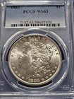 1883 PCGS MS 63 Morgan Silver Dollar. Fresh In New Holder!