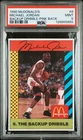 126855655 Michael Jordan 1990 McDonalds #6 Back Up Dribble Pink Back PSA 9
