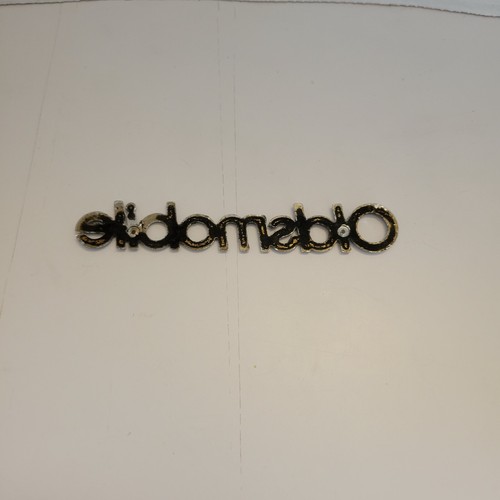 1981-1986 Oldsmobile Cutlass Header Panel Nameplate - Picture 6 of 8