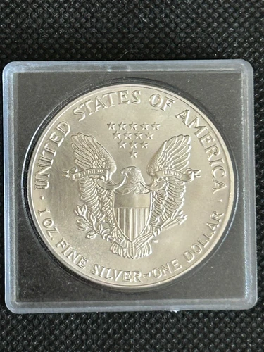 1987 SILVER EAGLE DOLLAR BULLION COIN IN UNCIRCULATED CONDITION (10 AVAILABLE)