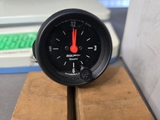 Auto Meter # 2632  Black Clock 2 1/16
