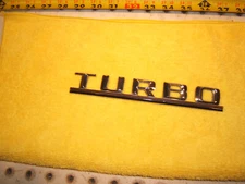 Genuine Mercedes W126 87 300SDL rear deck lid PLASTIC chrome TURBO OEM 1 emblem
