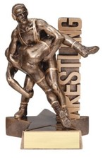 Wrestling trophy, about 6" tall, dual,with engraving, WRESTLING alongside guys