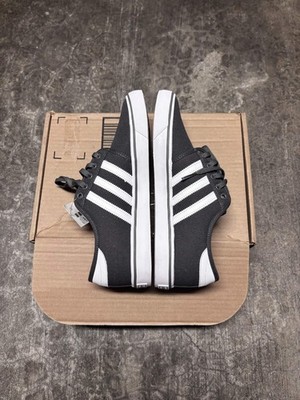 Adidas  Seeley sneakers CARBON BLACK  with white stripes  Size 8 US
