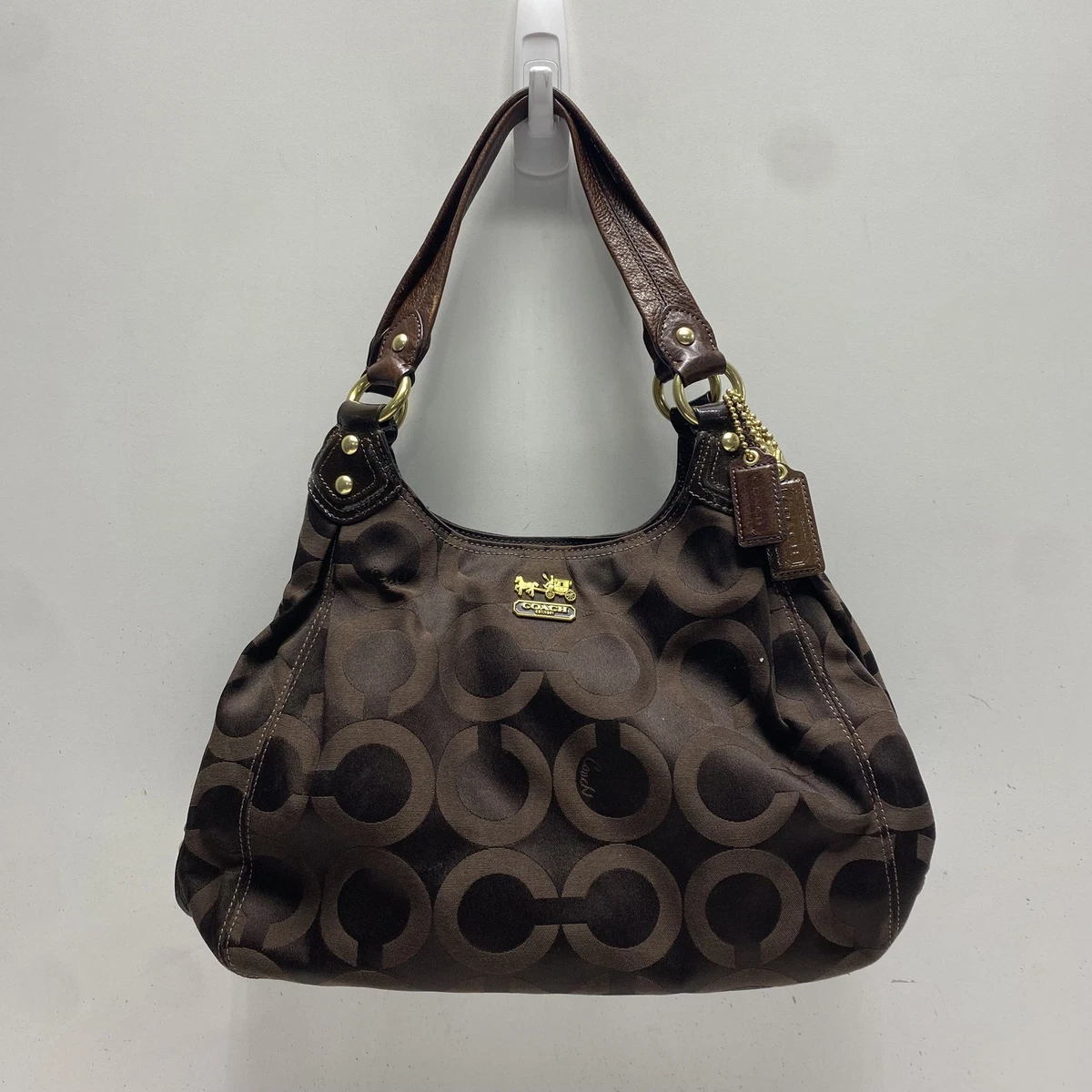 Preços baixos em Bolsa de ombro Coach Marrom Vintage Sacolas