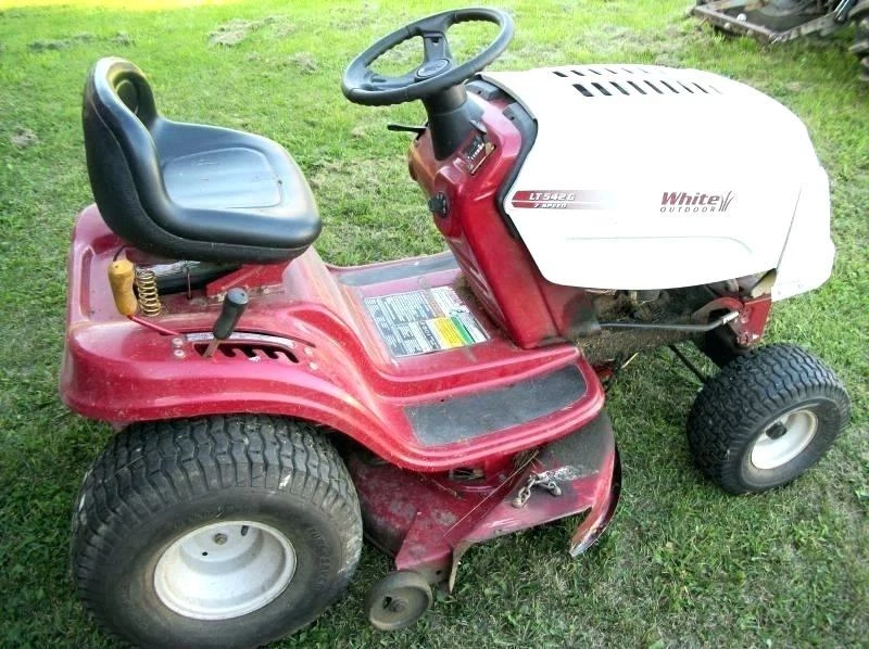 White outdoor outlet riding mower