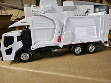 1/25 scale Mack® LR with McNeilus® Meridian™ Front Load Refuse Truck & Bin...