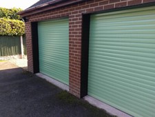 GARAGE DOOR ROLLER 7FT X 7FT INSULATED 2 REMOTES CHARTWELL GREEN RAL6021