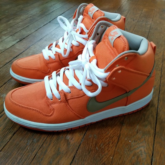 orange and white nike dunks high