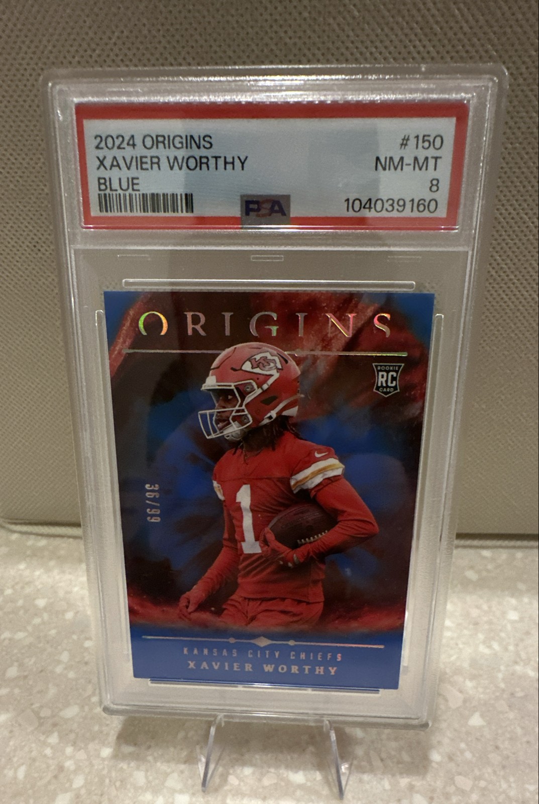 2024 Panini Origins - Rookies Xavier Worthy #150 Blue /99 (RC)