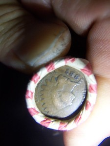 INDIAN HEAD & WHEAT PENNY ROLL WITH A 1887 INDIAN HEAD PENNY SHOWING