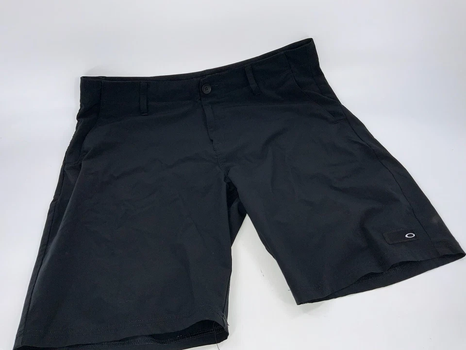 Pantalones cortos de golf Oakley para hombre talla 36 Frente plano polietileno negro sin defectos YGI H2-372 Foto 2 de 4