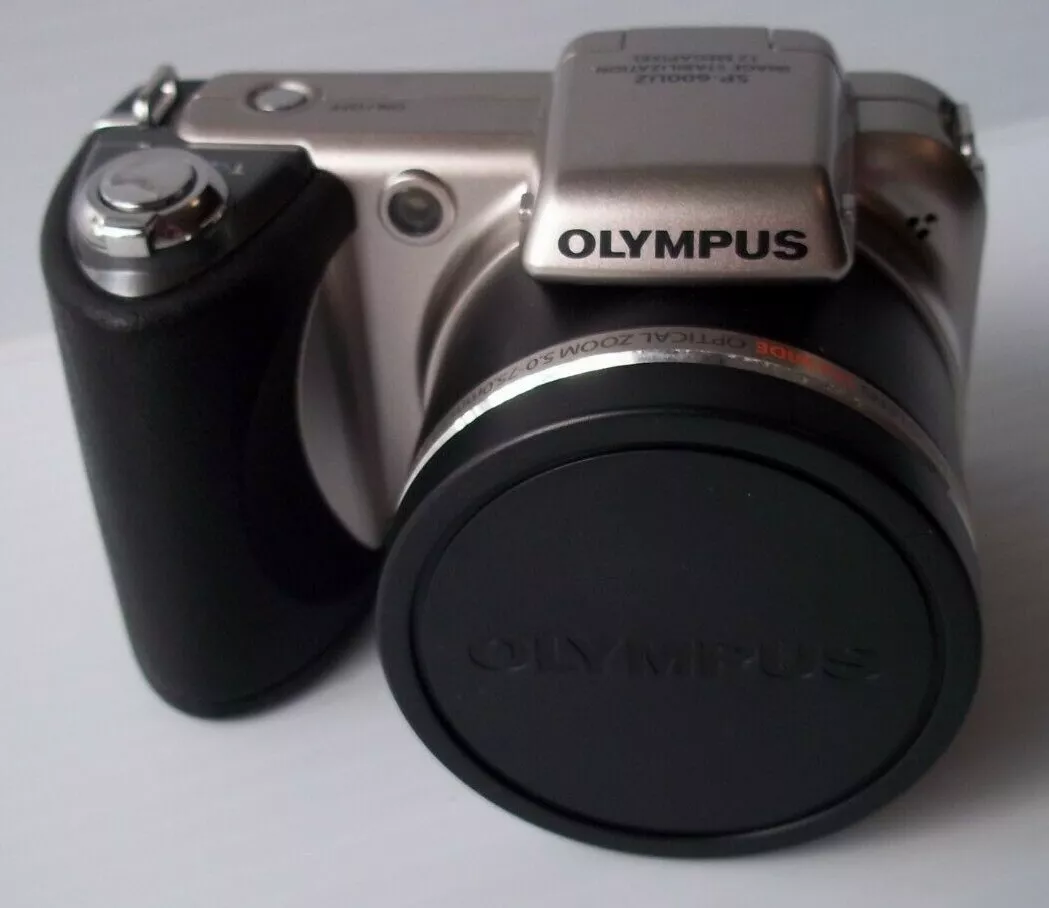 Olympus SP Series SP-600UZ 12.0 MP Digital Camera - Silver w/ 4 pocket case