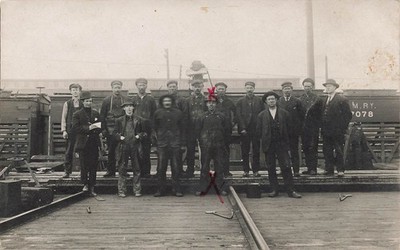 *RPPC~Anton Pearson & Others Standing in front of RR Cars, 1 Man Writing in Book