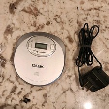 Classic CL157A Personal CD Player Silver LCD Display Headphones Power Adapter