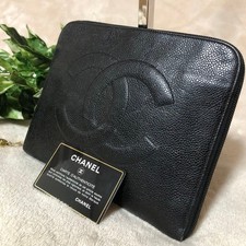 Chanel Clutch bag Black Leather Gold-tone hardware Chanel Caviar CC logo Pouch
