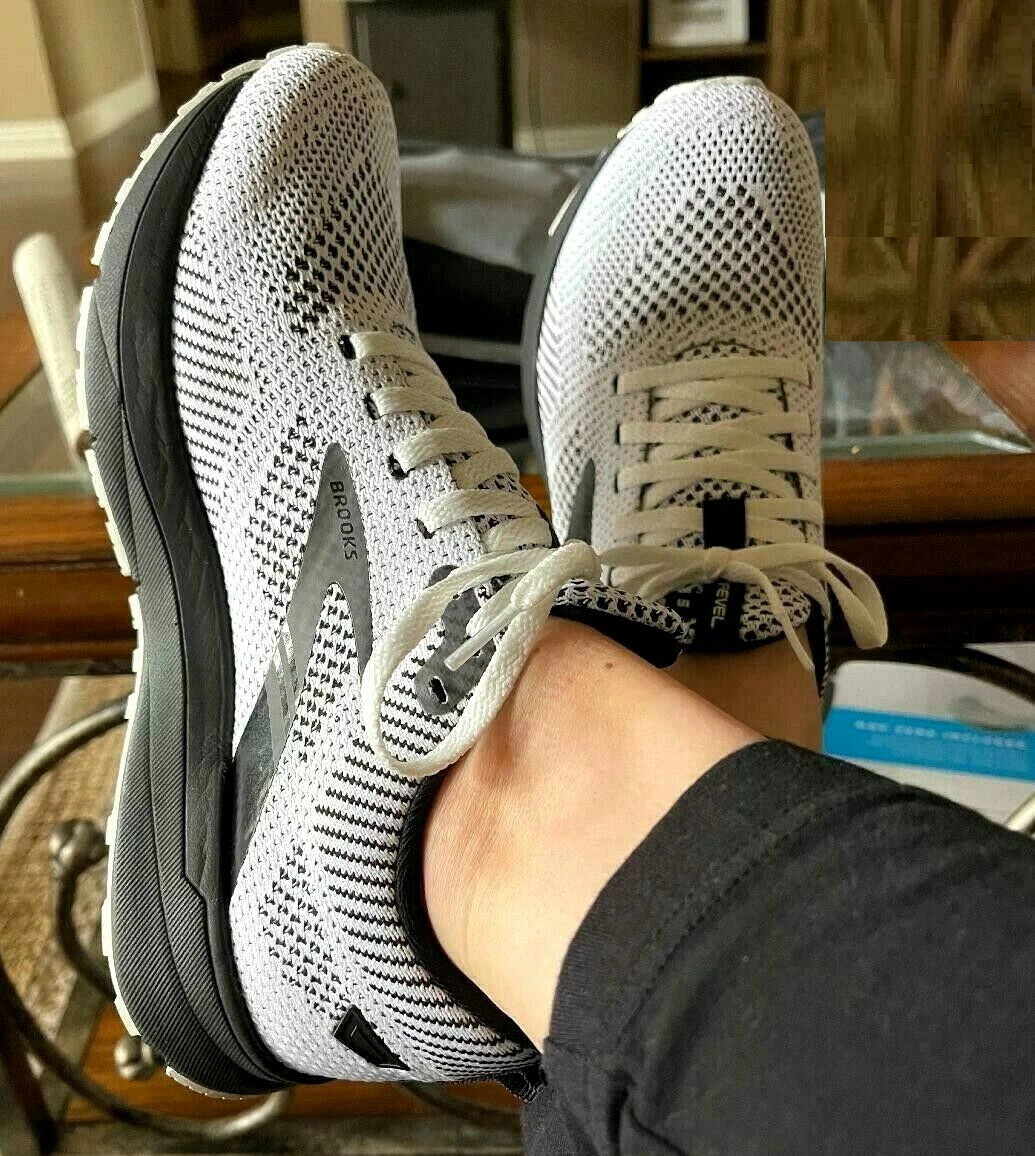 silver and white chanel sneakers