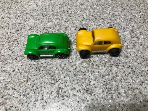 Two Tonka mini tote VW bug plastic metal yellow lime green cars Mexico 1970's