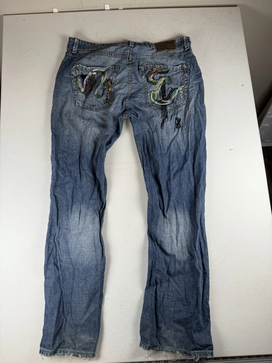 JEAN BOOTCUT MARC ECKO UNLTD. – TAILLE 34 X 28 – COTTON BLEND – DÉTAILS CUIR ET BRODERIE – OCCASION TRÈS BON ÉTAT