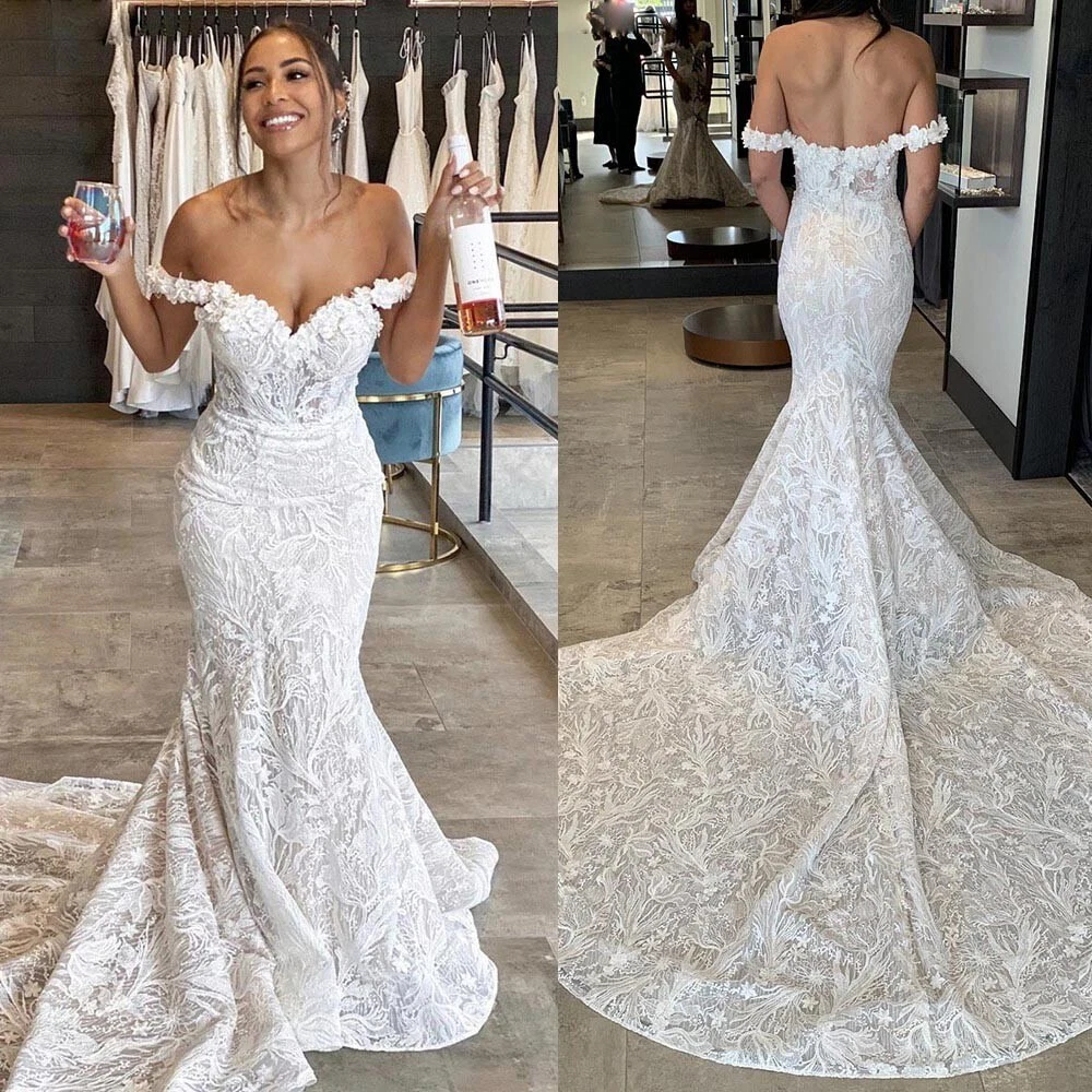 Exquisite off the shoulder fishtail wedding gown with tied bow sleeve