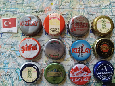 Türkei Kronkorken - 12 Bottle Caps from Turkey - Beer
