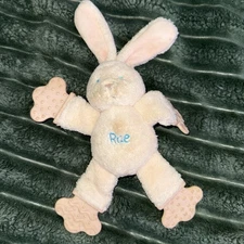 Kids II RAE bunny teether toy, cream colored plush, pink plastic feet