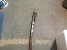 7-foot halberd, varnished oak handle, steel head.