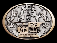 MA01160 *NOS* 1980s **UNIVERSAL SERVICES INC** INT'L SOLID BRASS OILFIELD BUCKLE