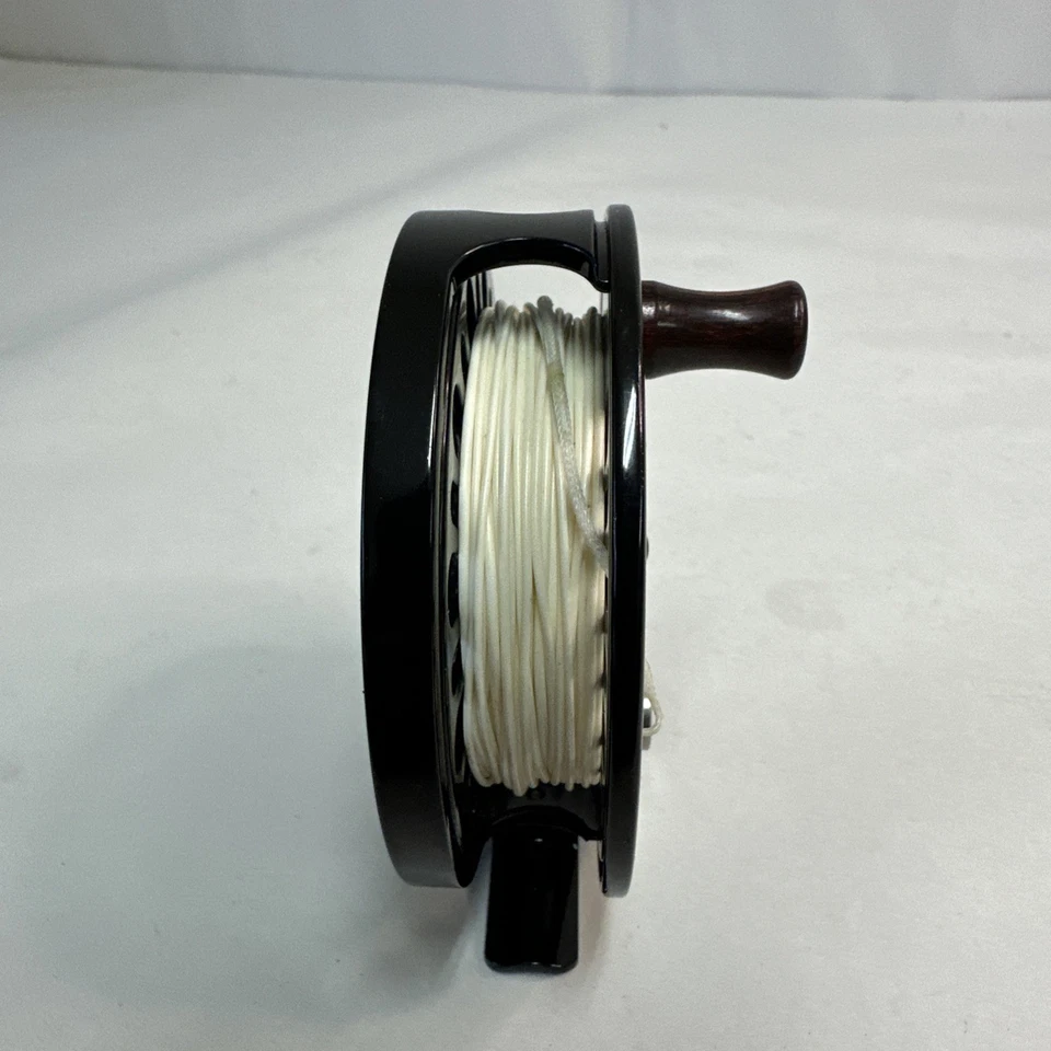 Carrete de pesca con mosca Abel Creek AC2 negro brillante. Hecho en USA. Con estuche. ENVÍO GRATIS Foto 2 de 4