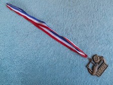 TRACK  FIELD AWARD BRONZE MEDAL WITH LANYARD. EASTERN QUAKER LADIES 2001-02