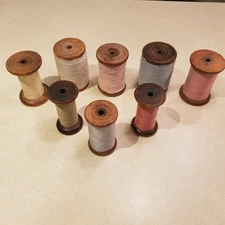 lot of 8 vintage wood spools with thread 4 inches tall various styles