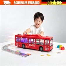 Großes rotes Spielzeugbus-Modell mit zu öff...