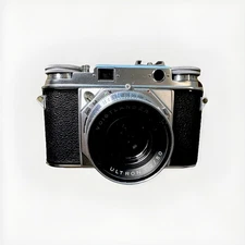 Mint ++ + Voigtlander Prominent 35mm Rangefinder w/Pristine Ultron 50 mm F 2
