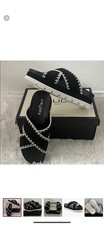J/SLIDES Black and White Crisscross Sandals