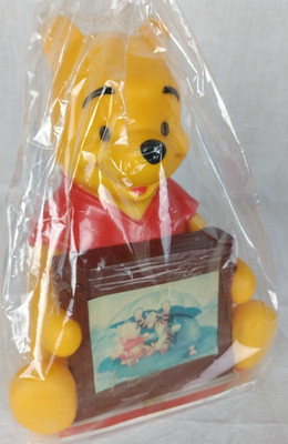 Tenyo Winnie the Pooh piggy bank & It also includes a 200-piece jigsaw puzzle.