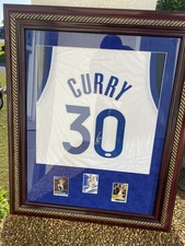 Steph Curry Autographed and Framed White Golden State Jersey Auto JSA COA