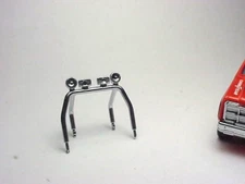 AFX FALL GUY ROLL BAR W/LIGHT  BAR. NEW INJECTION MOLDED PLASTIC