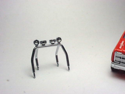 AFX FALL GUY ROLL BAR W/LIGHT  BAR. NEW INJECTION MOLDED PLASTIC