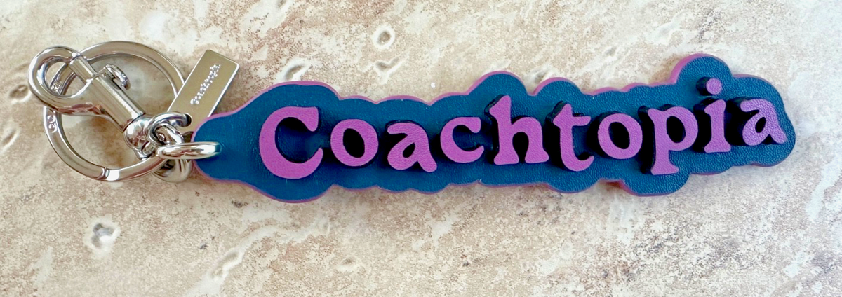 COACH COACHTOPIA BAG CHARM w/DUST BAG, BOX, AND TISSUE:NWOT LILAC